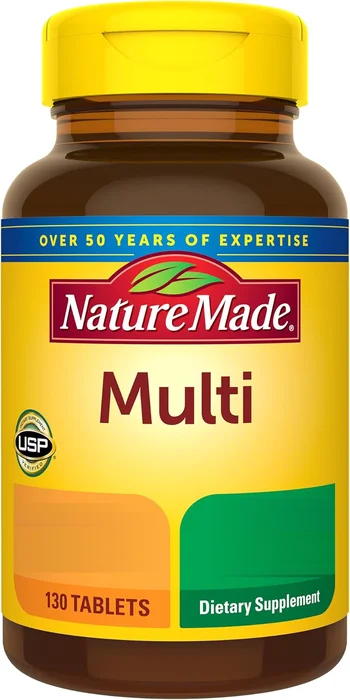 Nature Made Multi bottle, 130 tablets, seen from the front: amber glass with a yellow cap